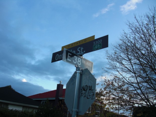 Street Signs Perpendicular To Each Other - Directions